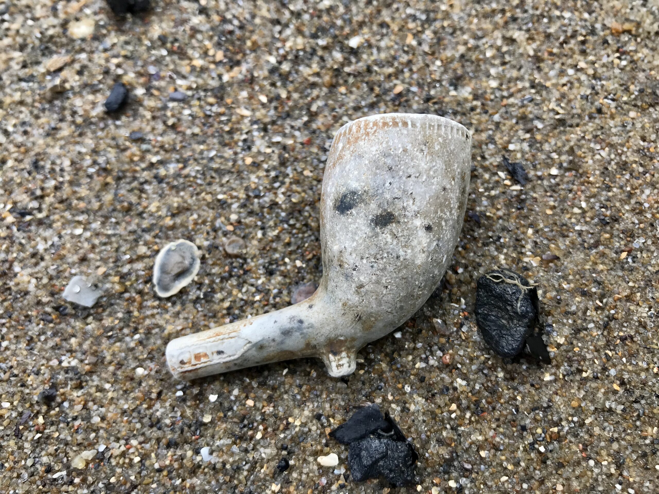 Clay tobacco pipe with CORK mark