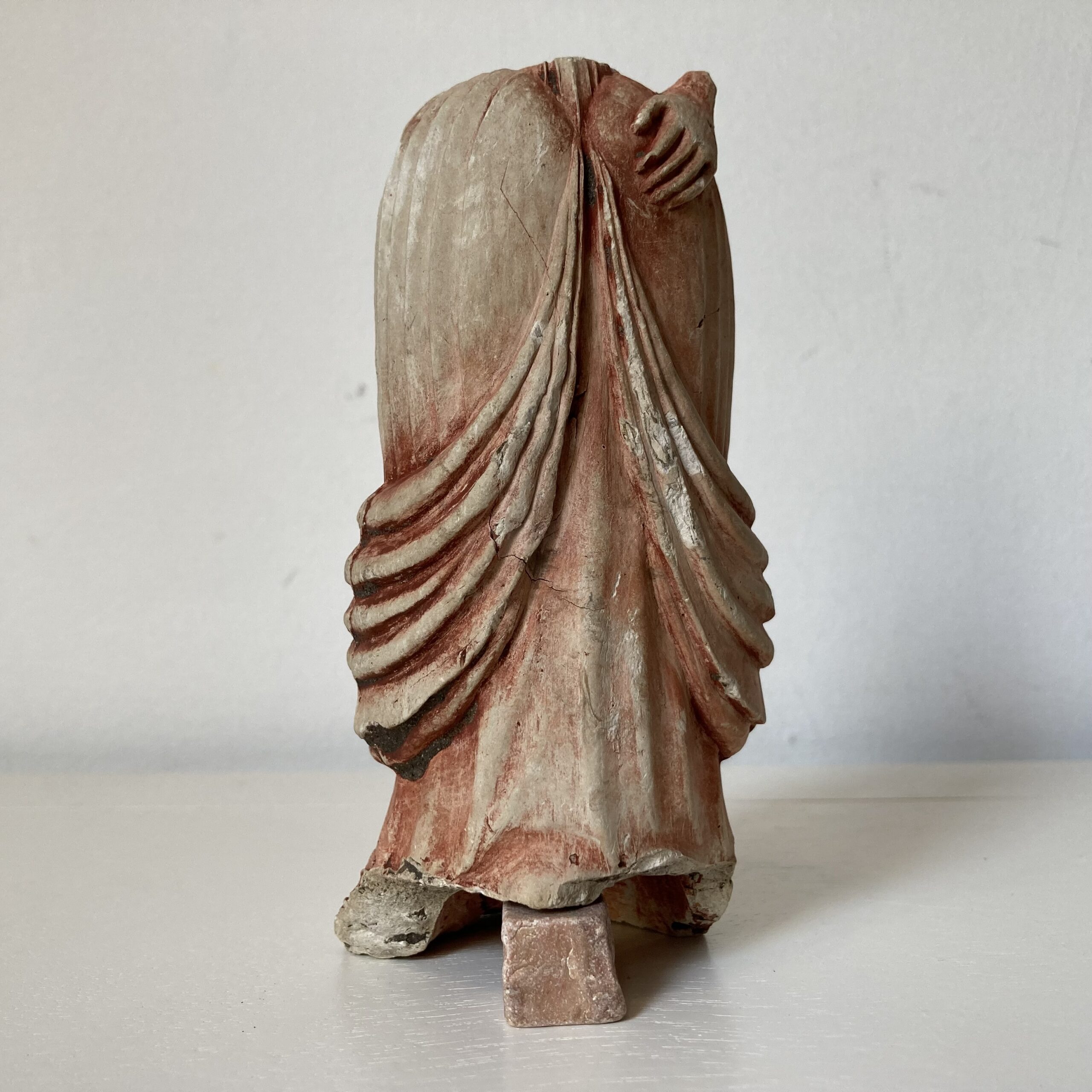 Figurine of woman in dress