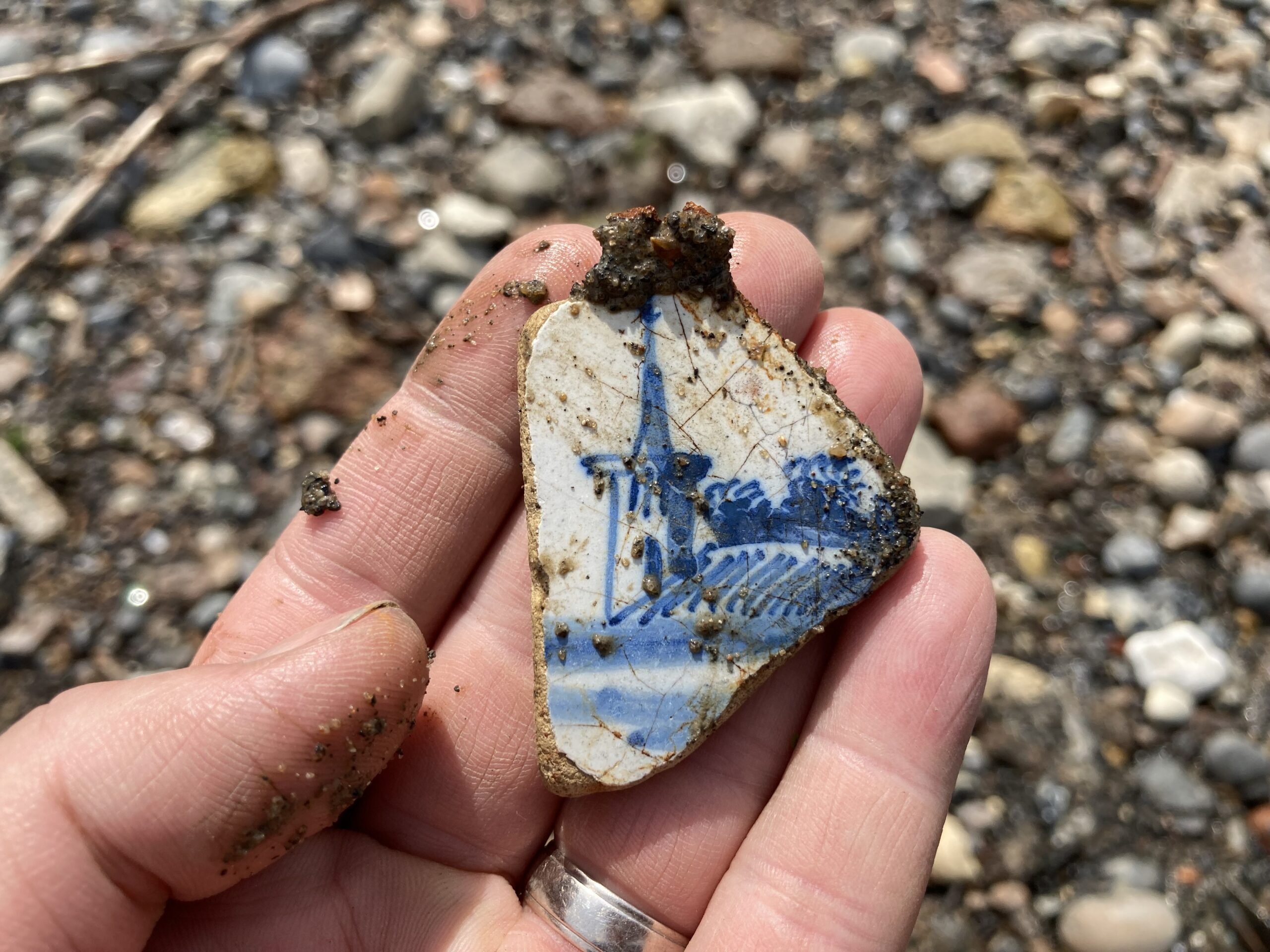 Sherd of tin-glazed Delftware tile depicting a church