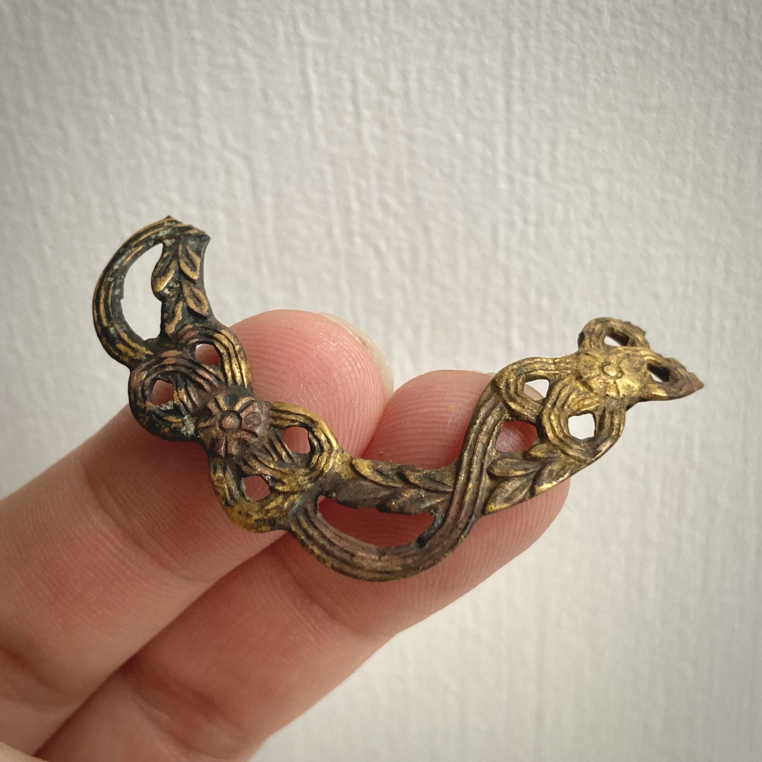 Fragment of decorated buckle